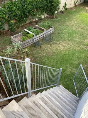 an overhead view of a garden with a set of stairs at Lovely Private room close to campus in Stellenbosch