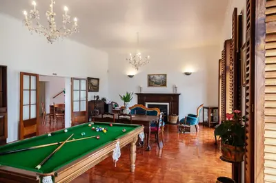 a living room with a pool table in it at Ayama Wine Farm - Manor House in Wellington