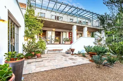 a courtyard in a house with plants at Serendipite Villa in Franschhoek