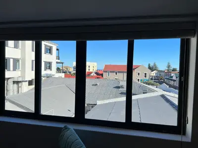 a view from a window of a roof at Waterfront Studio apartment no 5 in Hermanus