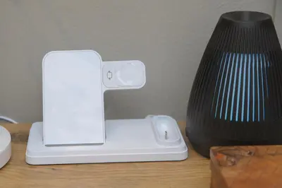 a white router sitting on a table next to a vase at Royal Pearl, Insta-worthy APT in Paarl