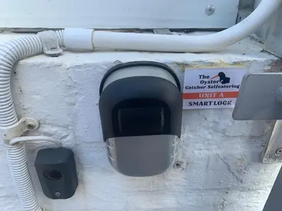 a fuel meter on the back of a boat at OysterCatcher Self-Catering Accommodation Strand in Cape Town