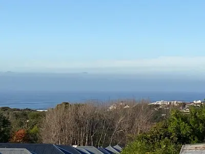 a view of the ocean from the roof of a house at Self Catering Luke Drive Onrus in Hermanus