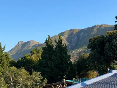 a view of mountains from the roof of a house at Self Catering Luke Drive Onrus in Hermanus
