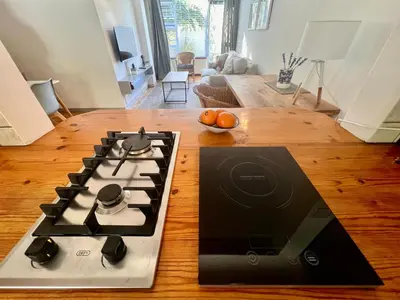 a stove top oven sitting on top of a wooden table at #Restyourcase in Stellenbosch