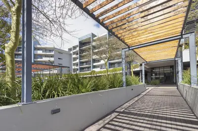 an external view of a building with a walkway at The Terraces 330 by Host Agents in Cape Town