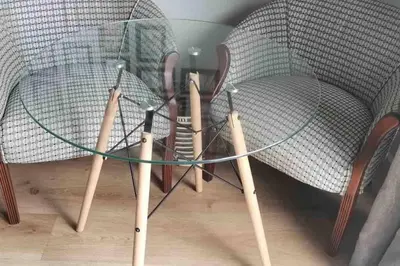 a group of cricket balls and bats in a chair at Blouberg Studio in Cape Town