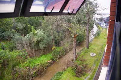 a view of a river from a train window at Tranquil Loft Design and Underground Parking in Stellenbosch