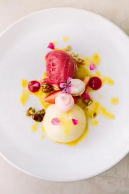 a white plate with a dessert on it at Endless Vineyards at Wildekrans Wine Estate in Botrivier