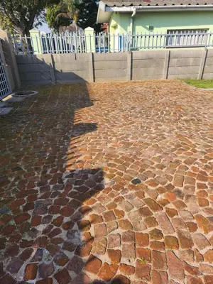 a cobblestone walkway in front of a house at Excel accommodation in Cape Town