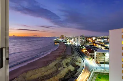 a view of the beach at night at Seaside Sunsets in Strand
