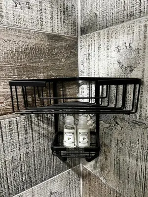 a shelf on a wall with two bottles on it at the Vine in Cape Town