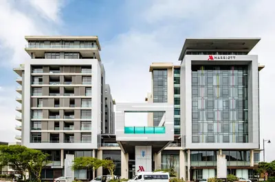 two tall buildings with a marriott sign on them at Belina - Crystal Towers Presidential Penthouse in Cape Town