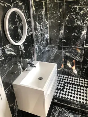 a bathroom with a white sink and a mirror at Comfort and Style in Cape Town