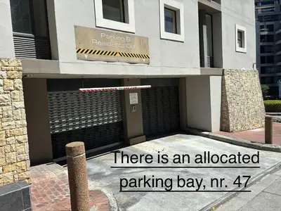 a sign that says there is an allocated parking bay in a building at Meerendahl Luxury Apartments at Tyger Lake in Cape Town