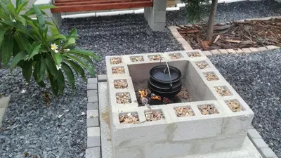 a fire pit with a pot on top of it at Durbanville Luxury Living Private Room in Durbanville