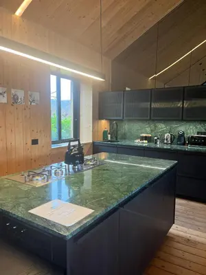 a kitchen with a green counter top in a room at Old Mac Daddy in Botrivier