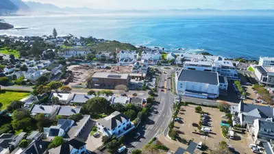an aerial view of a town next to the ocean at 2 Barford Haven in Hermanus