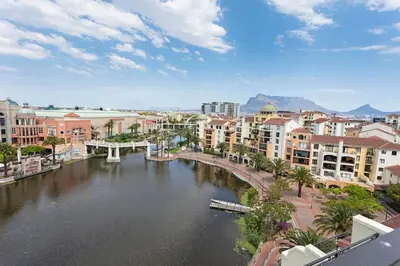 a view of a river in a city with buildings at 30% off Designer Penthouse - backup power - Cape Town in Cape Town