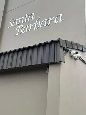 a sign for santa barbara on the side of a building at Top Floor Executive apartment in Cape Town