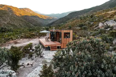 a tiny house in the middle of a mountain at Luxury Solace Cabin - River Cabin in Rawsonville