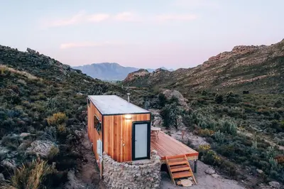 a tiny house in the middle of a mountain at Luxury Solace Cabin - River Cabin in Rawsonville