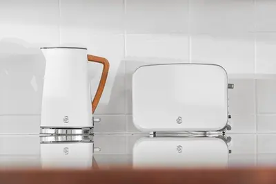 two lights sitting next to each other on a counter at Searenity Sands in Strand