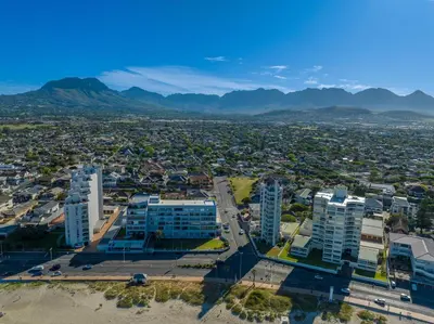 an aerial view of a city with tall buildings at Searenity Sands in Strand