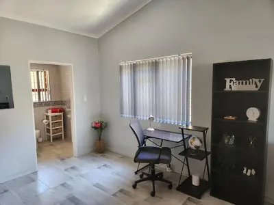 a room with a desk and a chair in it at Thys' Place in Cape Town