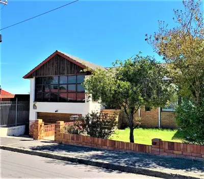 a house on the side of a street at 37 Toner Street North in Cape Town