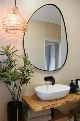 a bathroom with a sink and a mirror at Luxery Gem in Stellenbosch in Stellenbosch