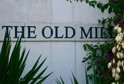 a sign that says the old mill on a wall at Gypsy Mama in Greyton in Greyton