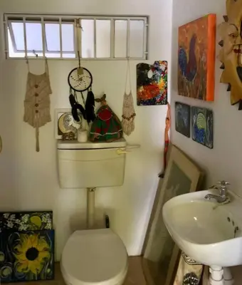 a bathroom with a toilet and a sink at Gypsy Mama in Greyton in Greyton