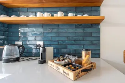 a tray of food on a counter in a kitchen at Franschhoek Colours in Franschhoek
