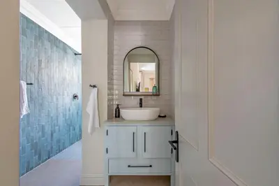 a bathroom with a sink and a mirror at Franschhoek Colours in Franschhoek