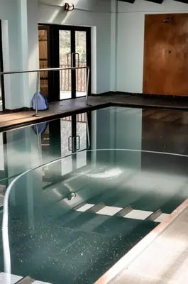 a glass table in a room with a glass floor at Mar-a-Stella Self-Catering Family Retreat in Bettyʼs Bay