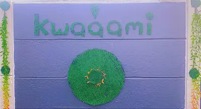 a purple cake with the word kucchini on it at Kwaaamiii in Cape Town
