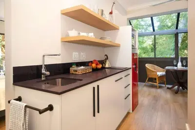 a kitchen with a sink and a counter top at The Oasis of Stellenbosch in Stellenbosch