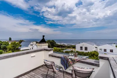 a view of the ocean from the balcony of a house at 3 on Vermont in Hermanus