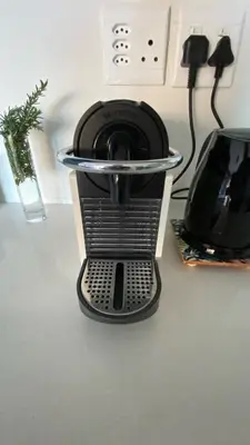 a coffee maker sitting on top of a table at Salt Shore Studios in Hermanus