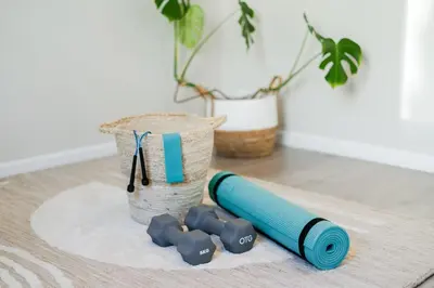 a blue rolled up thread next to a vase at Blouberg Coastal Hideout, Luxury Apartment with a Braai and Parking in Cape Town