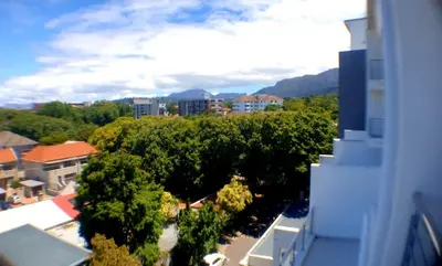 arial view of a city with trees and buildings at The Rondebosch Views in Cape Town