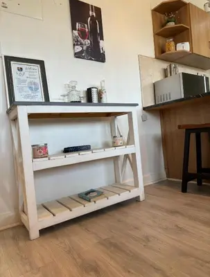 a shelf in a kitchen with a counter top at The Muscadel - Paarl - Self Catering Apartment in Paarl
