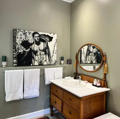 a bathroom with a sink and a mirror at Somerset West All Stay 3 in Somerset West