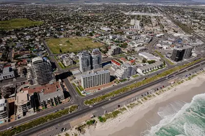 an aerial view of a city and the beach at Beach & Sea View Facing Apartment Japanese Styled in Cape Town