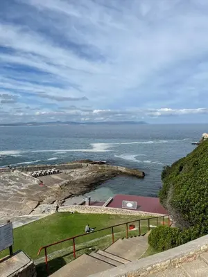 a view of the ocean from a bluff at Twin Gables, centrally located 2 bedroom apartment in Hermanus