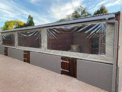 a building with a covering on the side of it at The Jack at Marnas Self Catering Accommodation in Cape Town
