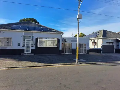 a house with solar panels on the roof at Abyssinia Guest House in Cape Town