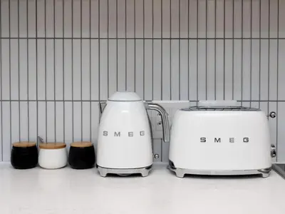 two toasters sitting next to each other on a shelf at Nine Palms 223B in Cape Town