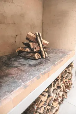 a pile of logs sitting on top of a counter at Hermanus Reefs in Hermanus